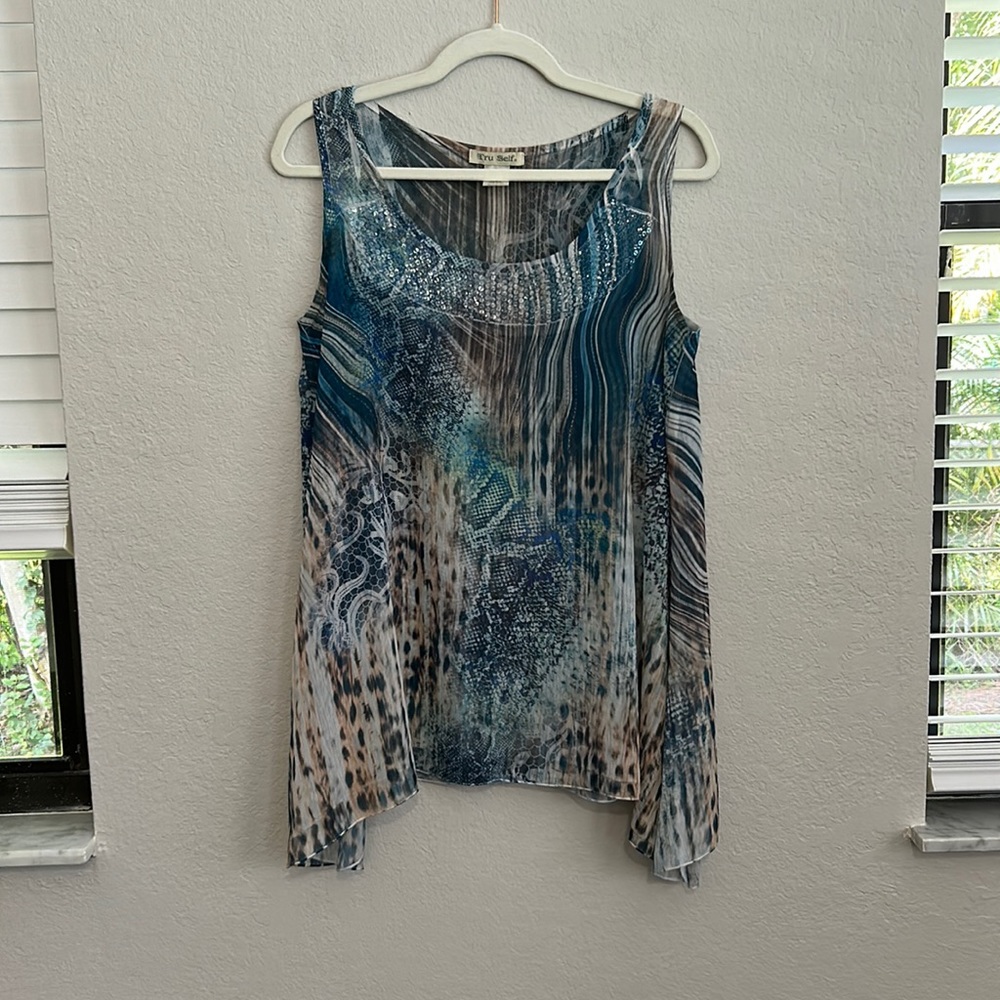 Pretty watercolor blouse with sparkly neckline!